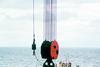 The monopiles are towed out to Excalibur and attached to the crane with a special male to female spear and latching system prior to a buoyant lift into the vertical.