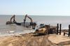 Works began with the demolition of existing groynes