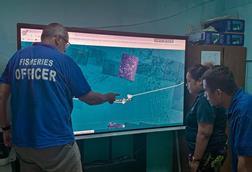 NZ MFAT-funded Fisheries Adviser assists NORMA officials in analysing the manoeuvring of an arriving vessel