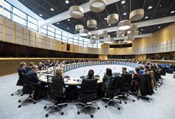 Delegates at a European Commission meeting sitting in a large oval