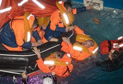Fishermen taking part in man overboard training