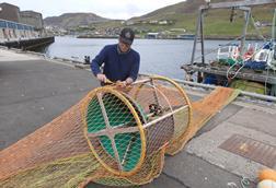 Smartrawl device being fitted into trawler net
