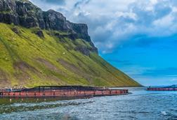 The image shows a view of SAIC's Portree fish farm