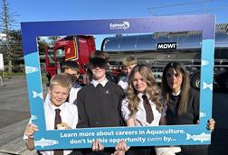 Pupils hold a selfie frame in front of a Fergusons Transport tanker