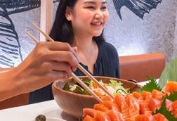 People enjoying seafood