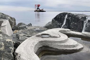 The image shows tide pools integrated into the rock breakwaters