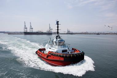 The image shows the Damen ASD Tug 2312 on the water