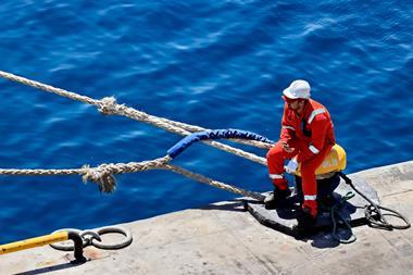 Seafarer sat on dockside