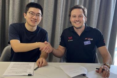 Danny Tao (L) and Luke Foster strike a strategic partnership