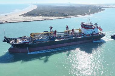 A picture of the Frederick Paup dredger on the water