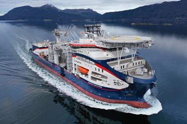 The image shows the cable-laying vessel Prysmian Monna Lisa on the water