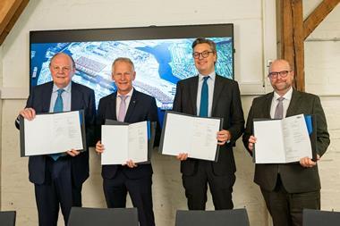 Four members of the HPA showcasing an expansion agreement for Waltershofer Haven