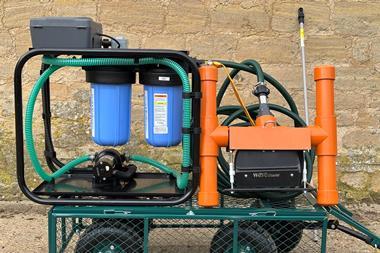 The image shows the Wavecleaner VAC on a trolley