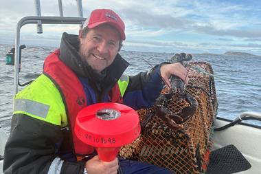 The image shows John Olav Florø-Larsen on board his vessel with the SmartOcean wave indicator