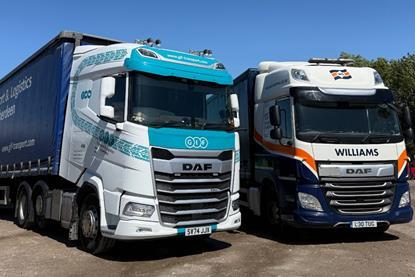The image shows a Williams Shipping and GIF Transport truck side by side