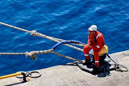 Seafarer sat on dockside