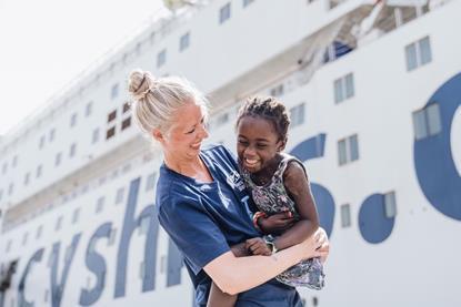 Mercy Ships - medic and child