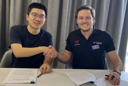 Danny Tao (L) and Luke Foster strike a strategic partnership