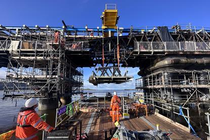 Lowering the old bridge sections onto the ScaffFloat