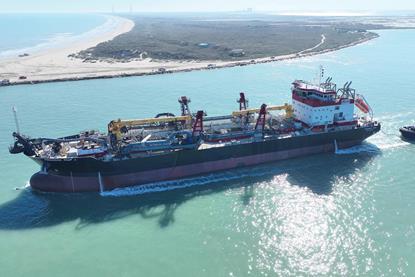 A picture of the Frederick Paup dredger on the water