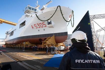 Major Hydro-Oceanographic Ship, 'Quirinale' with Fincantieri employee in the foreground