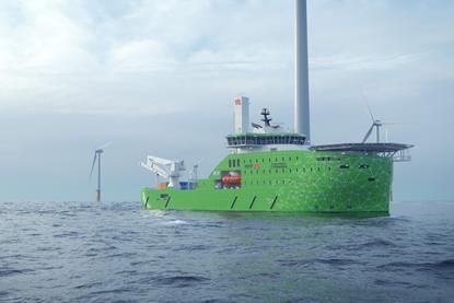 A Bibby Marine offshore service vessel on the water with wind turbines in the background