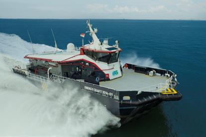 the image shows an AIRCAT vessel cutting through the waves on the water