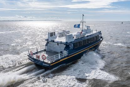 The image shows the Dutch ferry equipped with Hamilton LTX-0557 waterjets on the water