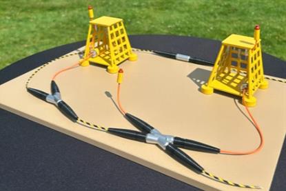 The image shows a model of the integrated fibre optic closures with advanced sensing and communication technologies