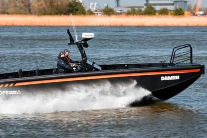 The image shows an HDPE workboat on the water