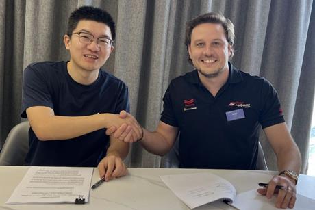 Danny Tao (L) and Luke Foster strike a strategic partnership