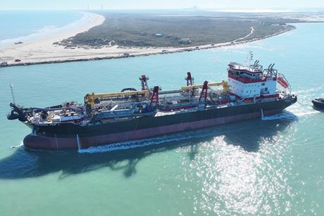A picture of the Frederick Paup dredger on the water