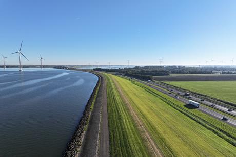 The image shows a drone photo of the foreshore at Lake Ijsselmeer