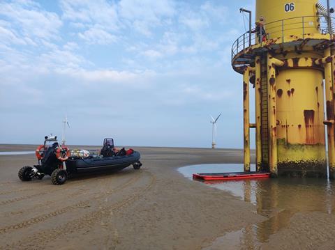 Sealegs hydraulically lowers to the sand to discharge technicians