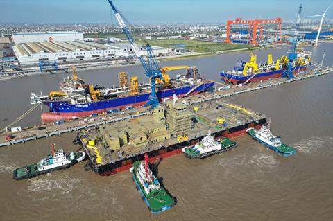The image shows the Alnokhada floating crane in construction