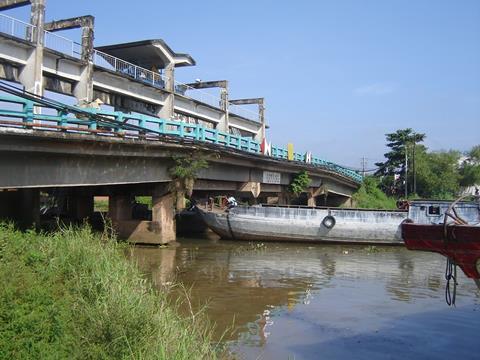 Many of the bridges over the Mekong River are too low to allow inland water transport.