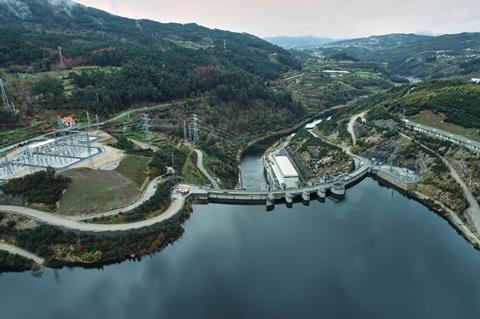 Back view of the Tâmega River Hydroelectric, with the reservoir at the bottom of the frame