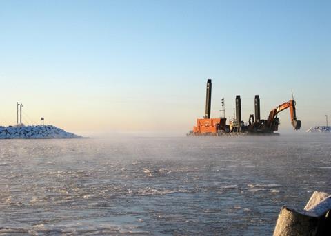 The Hitachi excavator at work on Wasa Dredging’s backhoe dredger.