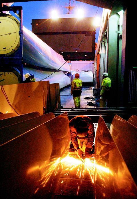 Wind turbine blades are loaded on board the MV Aleksandrov at the ABP Port of Southampton.