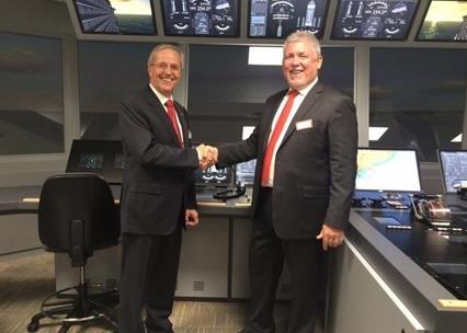 Capt. Capt. Hans Hederström, Managing Director of the CSMART and Frank Coles, Transas CEO at the CSMART / Arison Maritime Center Opening