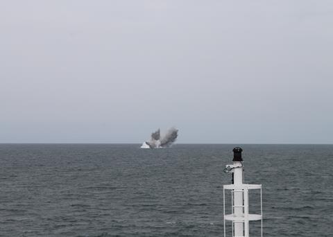 A controlled explosion initiated from a safe distance left an underwater crater 20m wide by 4m deep.
