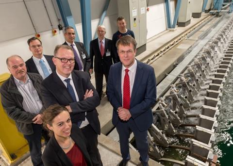 Ron van den Oetelaar (Bosch Rexroth), Bas Buchner (MARIN) and those involved at the MARIN Offshore Basin wave generator