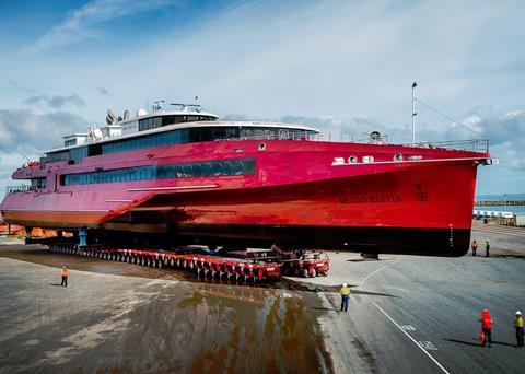 The 'Queen Beetle' safely came from the production hall to the ship lift on two Scheuerle SPMT platforms (Photo: Austal / TBHLS)