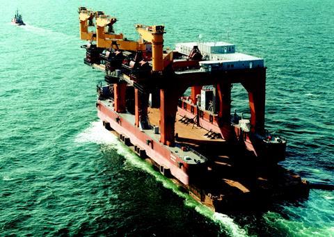 Barge AMT Trader of Anchor Marine Transportation is shown leaving for the 6000 mile voyage from Gdansk to Iskendrun in Turkey - transporting the new 5694 tonne coal trans-shipper Isken.
