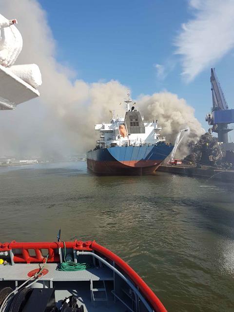 Tugs of Kotug Smit Towage tackle the recycling plant blaze at Ghent (Kotug Smit Towage)