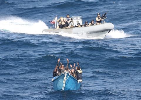 Suspected Somali pirates surrender to a US Navy patrol (Photo: US Navy/ Wikepedia Commons)